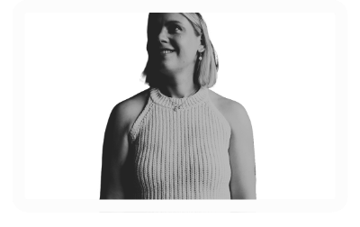 Egle Venclovas in a thoughtful moment — coaching women on clarity, confidence, and change